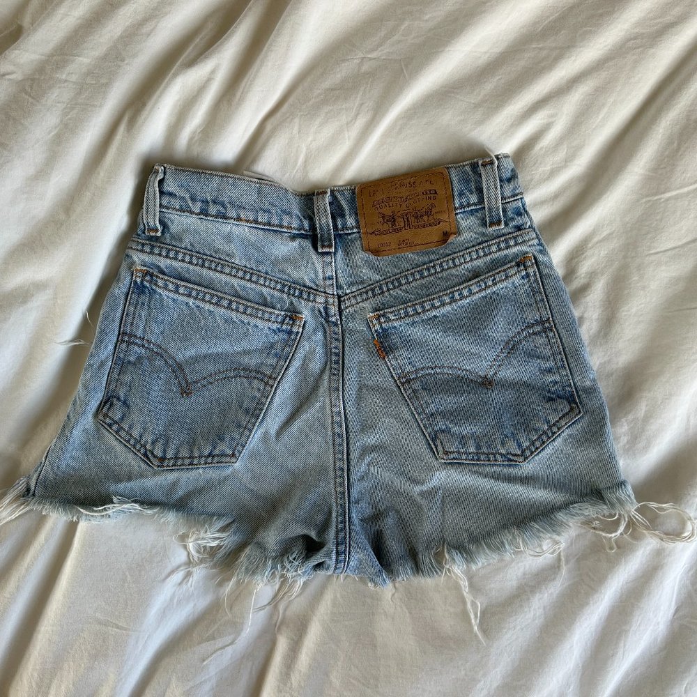 Vintage Levi's 🔥FURST OF A KIND distressed shorts Size 25
